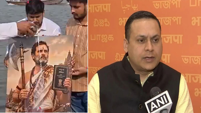 amit-malviya-and-congress-workers-pouring-milk-over-rahul-gandhi-photo-who-is-depicted-as-lord-parshuram.jpg
