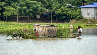 people-wade-through-a-flood-affected-area.jpg
